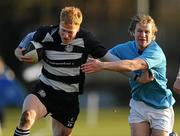 8 January 2011; Karl Miller, Old Belvedere, is tackled by Aran Healy, Garryowen. All-Ireland League Division 1A, Old Belvedere v Garryowen, Anglesea Road, Ballsbridge, Dublin. Picture credit: Stephen McCarthy / SPORTSFILE