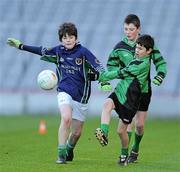 11 January 2011; Simon King, left, St. Pius X BNS, in action against Conor Doyle, right, St. Josephs BNS, with support from Michael Varley. Allianz Cumann na mBunscol Football Finals, Corn na nGearaltach, St. Pius X BNS, Terenure v St. Josephs BNS, Terenure. Croke Park, Dublin. Picture credit: Barry Cregg / SPORTSFILE