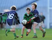 11 January 2011; Gavin Brady, left, St. Josephs BNS, in action against Stephen Cooke, left, and Michael Fitzgerald, St. Pius X BNS. Allianz Cumann na mBunscol Football Finals, Corn na nGearaltach, St. Pius X BNS, Terenure v St. Josephs BNS, Terenure. Croke Park, Dublin. Picture credit: Barry Cregg / SPORTSFILE