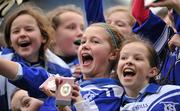 12 January 2011; Players from Scoil San Treasa, Mount Merrion, Dublin, from left, Rachel Wade, Amy Reeves and Louise Wilson celebrate with their medals after the game. Allianz Cumann na mBunscol Football Finals, Austin Finn Shield, Our Lady of Good Counsel, Johnstown, Cabinteely, Dublin v Scoil San Treasa, Mount Merrion, Dublin. Croke Park, Dublin. Picture credit: Brendan Moran / SPORTSFILE