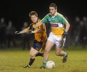 12 January 2011; James Keane, Offaly, in action against David Kelly, DCU. O'Byrne Cup, Offaly v DCU, Rhode, Co. Offaly. Picture credit: Brian Lawless / SPORTSFILE