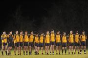 12 January 2011; The DCU team stand for a minutes silence before the game. O'Byrne Cup, Offaly v DCU, Rhode, Co. Offaly. Picture credit: Brian Lawless / SPORTSFILE