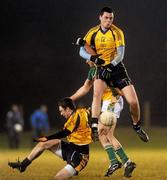 12 January 2011; Donal Shine and Martin McElhiney, left, DCU, in action against Ciaran McManus, Offaly. O'Byrne Cup, Offaly v DCU, Rhode, Co. Offaly. Picture credit: Brian Lawless / SPORTSFILE
