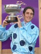 10 September 2016; Jockey Christophe Soumillon celebrates with the trophy after winning the QIPCO Irish Champion Stakes  on Almanzor at Leopardstown Racecourse in Dublin. Photo by Cody Glenn/Sportsfile