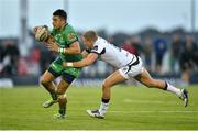 10 September 2016; Tiernan O' Halloran of Connacht is tackled by Ben John of Ospreys during the Guinness PRO12 Round 2 match between Connacht and Ospreys at the Sportsground in Galway. Photo by Ray Ryan/Sportsfile