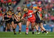 11 September 2016; Rachel O'Shea of Cork, supported by team-mate Sarah Fahy, behind, in action against Kilkenny's, from left, Angela Kenneally, Katie Nolan and Niamh Sweeney during the Liberty Insurance All-Ireland Intermediate Camogie Championship Final match between Cork and Kilkenny at Croke Park in Dublin. Photo by Piaras Ó Mídheach/Sportsfile