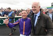 11 September 2016; Frankie Dettori celebrates with trainer Willie Mullins after winning the Palmerstown House Estate Irish St. Leger at The Curragh in Co. Kildare. Photo by Cody Glenn/Sportsfile