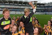 11 September 2016; Kilkenny manager Ann Downey lifting the the O'Duffy Cup amonst her players after the Liberty Insurance All-Ireland Senior Camogie Championship Final match between Cork and Kilkenny at Croke Park in Dublin. Photo by Eóin Noonan/Sportsfile