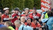 11 September 2016; Competitors have a team photo taken after finishing The Great Dublin Bike Ride 2016 at Smithfield Square in Dublin 7. Photo by David Fitzgerald/Sportsfile