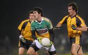 12 January 2011; Richie Dalton, Offaly, in action against Fionn O'Shea, DCU. O'Byrne Cup, Offaly v DCU, Rhode, Co. Offaly. Picture credit: Brian Lawless / SPORTSFILE
