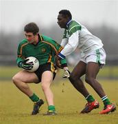 12 January 2011; Barry Horan, right, St. Benildus Colege, in action against Efe Siode, Colaiste Mhuire Mullingar. Leinster Colleges Senior Football A Championship, Round 1, Colaiste Mhuire Mullingar v St. Benildus Colege, St. Loman's GAA Club, Lakepoint Park, Mullingar, Co. Westmeath. Picture credit: Barry Cregg / SPORTSFILE