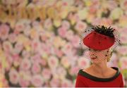 10 September 2016; A racegoer watches on during the Champion Hat competition at Leopardstown Racecourse in Dublin. Photo by David Fitzgerald/Sportsfile