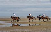 13 September 2016; Runners and riders make their way down the strand for the start of the Racing Post Handicap during the Laytown Races in Laytown, Co Meath. Photo by David Maher/Sportsfile