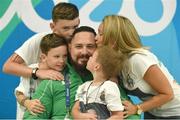 13 September 2016; Phillip Eaglesham of Ireland with his wife Julie and three sons Tyler, aged 9, Travis, aged 13, and Mason, aged 6, after he competed in the Mixed 10m Air Rifle Prone SH2 Qualifier at the Olympic Shooting Centre during the Rio 2016 Paralympic Games in Rio de Janeiro, Brazil. Photo by Diarmuid Greene/Sportsfile