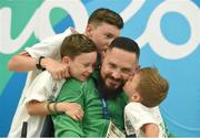 13 September 2016; Phillip Eaglesham of Ireland with his three sons Tyler, aged 9, Travis, aged 13, and Mason, aged 6, after he competed in the Mixed 10m Air Rifle Prone SH2 Qualifier at the Olympic Shooting Centre during the Rio 2016 Paralympic Games in Rio de Janeiro, Brazil. Photo by Diarmuid Greene/Sportsfile