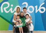 13 September 2016; Phillip Eaglesham of Ireland with his wife Julie and three sons Mason, aged 6, Travis, aged 13, and Tyler, aged 9, after he competed in the Mixed 10m Air Rifle Prone SH2 Qualifier at the Olympic Shooting Centre during the Rio 2016 Paralympic Games in Rio de Janeiro, Brazil. Photo by Diarmuid Greene/Sportsfile