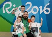 13 September 2016; Phillip Eaglesham of Ireland with his three sons Mason, aged 6, Travis, aged 13, and Tyler, aged 9, after he competed in the Mixed 10m Air Rifle Prone SH2 Qualifier at the Olympic Shooting Centre during the Rio 2016 Paralympic Games in Rio de Janeiro, Brazil. Photo by Diarmuid Greene/Sportsfile