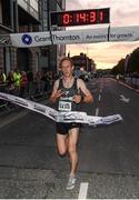 13 September 2016; Mark Kirwan wins the Grant Thornton Corporate 5K Team Challenge 2016 at Dublin Docklands. Photo by Stephen McCarthy/Sportsfile