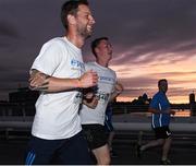 13 September 2016; Seb Daly, left, Team Sportsfile, on his way to 2503th place in a nett time of 25:44 and Eóin Noonan, who finished 2667th in a nett time of 26:13 during the Grant Thornton Corporate 5K Team Challenge 2016 at Dublin Docklands. Photo by Ray McManus/Sportsfile