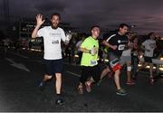 13 September 2016; Sean O'Flaherty, Team Sportsfile, on his way to 3392th place in a nett time of 29:11 during the Grant Thornton Corporate 5K Team Challenge 2016 at Dublin Docklands. Photo by Ray McManus/Sportsfile