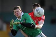16 January 2011; Ian Ryan, Limerick, in action against Eoin Cotter, Cork. McGrath Cup Quarter-Final, Limerick v Cork, Gaelic Grounds, Limerick. Picture credit: Brian Lawless / SPORTSFILE