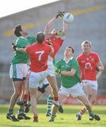 16 January 2011; David Goold, Alan O'Connor, and Tom O'Neill, right, Cork, in action against John Galvin, left, and Alan O'Connor, Limerick. McGrath Cup Quarter-Final, Limerick v Cork, Gaelic Grounds, Limerick. Picture credit: Brian Lawless / SPORTSFILE