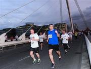 13 September 2016; Colin Moran, Bank of Ireland, on his way to finishing in 1353th place in a net time of 22:30 during the Grant Thornton Corporate 5K Team Challenge 2016 at Dublin Docklands. Photo by Ray McManus/Sportsfile
