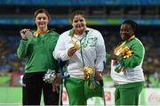 15 September 2016; Orla Barry of Ireland, left, with her silver medal, alongside gold medallist Nassima Saifi of Algeria, centre, and bronze medallist Eucharia Iyiazi of Nigeria during the medal ceremony of the Women's Discus F57 Final at the Olympic Stadium during the Rio 2016 Paralympic Games in Rio de Janeiro, Brazil. Photo by Diarmuid Greene/Sportsfile