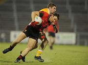 19 January 2011; Danny Hughes, Down, in action against Tony Scullion, Antrim. Barrett Sports Lighting Dr. McKenna Cup, Section C, Antrim v Down, Casement Park, Belfast, Co. Antrim. Picture credit: Oliver McVeigh / SPORTSFILE