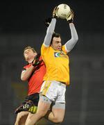 19 January 2011; Kevin Niblock, Antrim, in action against Peter Fitzpatrick, Down. Barrett Sports Lighting Dr. McKenna Cup, Section C, Antrim v Down, Casement Park, Belfast, Co. Antrim. Picture credit: Oliver McVeigh / SPORTSFILE