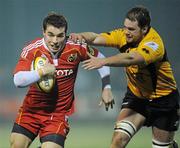 21 January 2011; Sean Scanlon, Munster A, is tackled by James Inglis, Esher RFC. British & Irish Cup, Munster A v Esher RFC, Garryowen FC, Dooradoyle, Limerick. Picture credit: Diarmuid Greene / SPORTSFILE