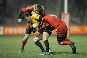 21 January 2011; Rob Kirby, Esher RFC, is tackled by Danny Barnes, left, and Duncan Williams, Munster A. British & Irish Cup, Munster A v Esher RFC, Garryowen FC, Dooradoyle, Limerick. Picture credit: Diarmuid Greene / SPORTSFILE