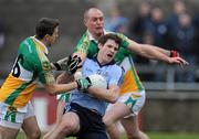 22 January 2011; Graham Cullen, Dublin, in action against Karol Slattery, left, and Scott Brady, Offaly. O'Byrne Shield Semi-Final, Dublin v Offaly, Parnell Park, Dublin. Picture credit: Brian Lawless / SPORTSFILE