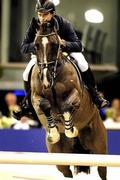 22 January 2011; Denis Lynch, on Tarpan, in action during the Deli XL Prize competition. Jumping Amsterdam, Amsterdam RAI, Amsterdam, Netherlands. Picture credit: Dwight Rompas / SPORTSFILE