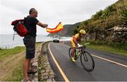16 September 2016; Juan José Méndez Fernández of Spain is cheered on by a Spain supporter during the Men's C1-3 Road Race at the Pontal Cycling Road during the Rio 2016 Paralympic Games in Rio de Janeiro, Brazil. Photo by Diarmuid Greene/Sportsfile