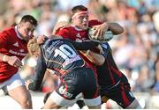 17 September 2016; CJ Stander of Munster is tackled by Angus O'Brien of Newport Gwent Dragons during the Guinness PRO12 Round 3 Match at Rodney Parade, Newport in Wales. Photo by Ben Evans/Sportsfile