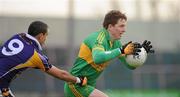 23 January 2011; Paschal Kellaghan, Rhode, in action against Craig Dias, Kilmacud Crokes. AIB Leinster GAA Football All-Ireland Senior Club Championship Final, Rhode v Kilmacud Crokes, O'Moore Park, Portlaoise, Co. Laois. Picture credit: Ray McManus / SPORTSFILE