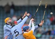 23 January 2011; Dublin players left to right, Martin Quilty, Niall Corcoran and John McCaffrey, in action against Karl McKeegan, Antrim. Walsh Cup Quarter-Final, Dublin v Antrim, Parnell Park, Dublin. Picture credit: David Maher / SPORTSFILE