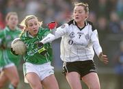23 January 2011; Niamh Kilkenny, Caltra Cuans, Galway, in action against Christianne Hunter, St Enda’s, Tyrone. Tesco All-Ireland Junior Ladies Football Club Championship Final Replay, Caltra Cuans, Galway v St Enda’s, Tyrone, Mullahoran, Cavan. Photo by Sportsfile
