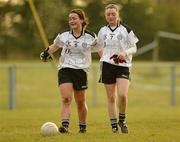 23 January 2011; Dejected St Enda’s, Tyrone, players Caoimhe McGovern, left, and Christianne Hunter, at the end of the game. Tesco All-Ireland Junior Ladies Football Club Championship Final Replay, Caltra Cuans, Galway v St Enda’s, Tyrone, Mullahoran, Cavan. Photo by Sportsfile
