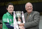 23 January 2011; Pat Quill, President, Cumann Peil Gael na mBan presents Caltra Cuans, Galway, captain Ciara Kilroy with the cup. Tesco All-Ireland Junior Ladies Football Club Championship Final Replay, Caltra Cuans, Galway v St Enda’s, Tyrone, Mullahoran, Cavan. Photo by Sportsfile