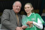 23 January 2011; Pat Quill, President, Cumann Peil Gael na mBan, presents the Player of the Match Award to Niamh Kilkenny, Caltra Cuans, Galway. Tesco All-Ireland Junior Ladies Football Club Championship Final Replay, Caltra Cuans, Galway v St Enda’s, Tyrone, Mullahoran, Cavan. Photo by Sportsfile