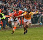 23 January 2011; Gareth Swift, Armagh, in action against Tony Scullion, Antrim. Barrett Sports Lighting Dr. McKenna Cup Section A, Armagh v Antrim, Athletic Grounds, Armagh. Picture credit: Michael Cullen / SPORTSFILE