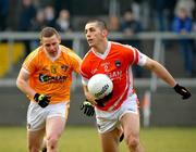 23 January 2011; Vincent Martin, Armagh, in action against Paddy Cunningham, Antrim. Barrett Sports Lighting Dr. McKenna Cup Section A, Armagh v Antrim, Athletic Grounds, Armagh. Picture credit: Michael Cullen / SPORTSFILE