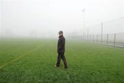 23 January 2011; Match referee Barry Kelly inspects the conditions prevailing at the Heywood Community Grounds before deciding to switch the game to  St Patrick's GAA Club, Ballyragget, Co Kilkenny. Walsh Cup, Kilkenny v NUI Galway, Heywood Community School, Balinakill, Co. Laois. Picture credit: Ray McManus / SPORTSFILE