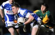 25 January 2011; Paul Begley, Laois, in action against Paddy Gilsenan, Meath. O'Byrne Shield Semi-Final, Meath v Laois, Pairc Tailteann, Navan, Co. Meath. Picture credit: Brian Lawless / SPORTSFILE