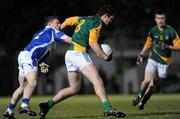 25 January 2011; Thomas Walsh, Meath, in action against Paul Begley, Laois. O'Byrne Shield Semi-Final, Meath v Laois, Pairc Tailteann, Navan, Co. Meath. Picture credit: Brian Lawless / SPORTSFILE
