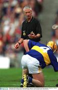 9 September 2001; Referee Pat O'Connor signals for Tipperary's Paul Ormonde to get back on his feet. Tipperary v Galway, All Ireland Senior Hurling Final, Croke Park, Dublin. Picture credit; Brendan Moran / SPORTSFILE