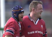 15 September 2001; Munsters Mike Mullins, left, is congratulated on scoring his try by team captain Mick Galwey. Munster v Cardiff, Celtic League, Thomond Park, Limerick. Rugby. Picture credit; Brendan Moran / SPORTSFILE *EDI*
