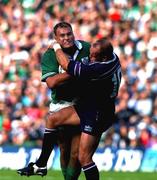 22 September 2001; Ireland's Jeremy Davidson is tackled by Scotland's Gregor Townsend. Scotland v Ireland, Six Nations Rugby Championship, Murrayfield, Edinburgh, Scotland. Picture Credit; Matt Browne / SPORTSFILE *EDI*
